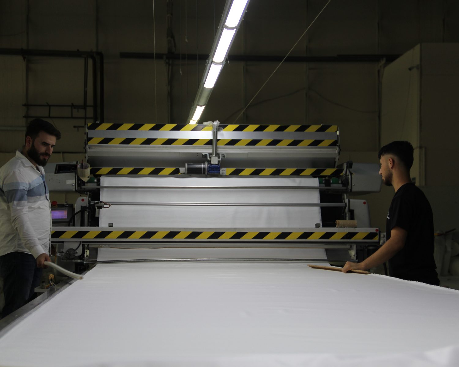 Fabric spreading and cutting preparation at the CRISTAL7 factory